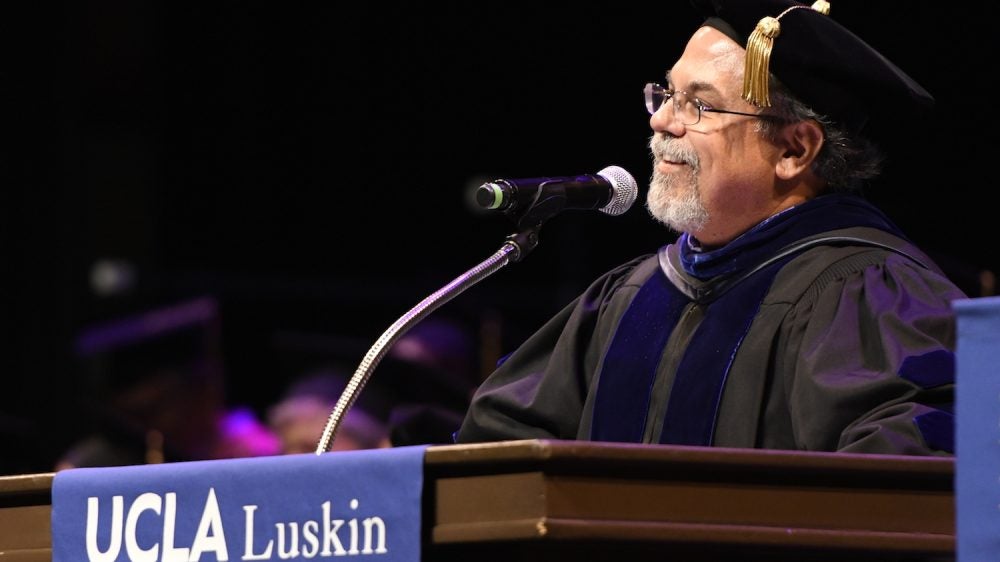 'Act! Make this world better. Make this country what it aspires to be,' Dean Gary Segura told the graduating class in 2018. Photo by John McCoy