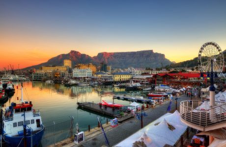 Photo of Port in South Africa with boats on the harbor and a ferris wheel far away on the right