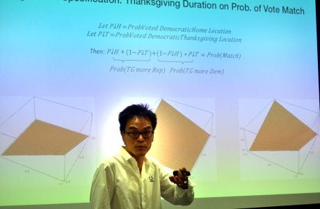 Keith Chen presented "What Can We Learn from Tracking Smartphones?" Photos by Stan Paul