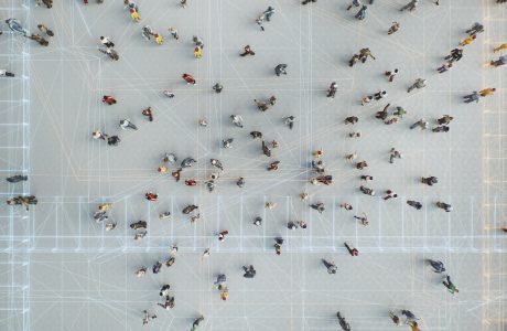 Abstract crowds of people with virtual reality street display.