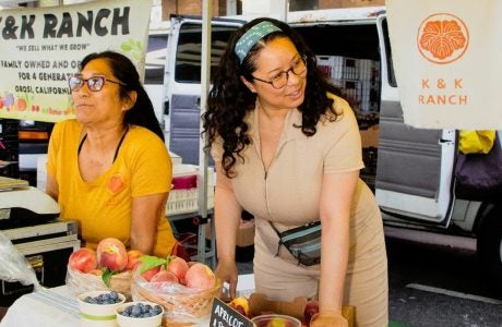 Dorothy Faye Pirtle (right) with Terri Kashima of K&K Ranch at a local farmers market.