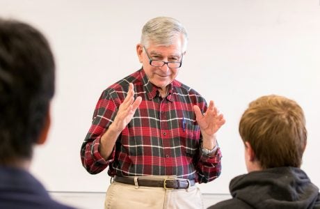 file photo of Michael Dukakis in a classroom|historical photo shows Michael Dukakis in 1975 during a meeting with students and faculty in Massachusetts|Mike Dukakis gestures as he speaks with a woman in 2010||Albert Carnesale speaks during a gathering with other faculty members in honor of Mike Dukakis|Michael and Kitty Dukakis pose with Zev Yaroslavsky in 2018|Michael Dukakis is seated in front of a classroom full of students|Michael Dukakis stands and talks in March 2017 with Renee Luskin and Mark Peterson|professor Dan Mitchell|file image from 2015 shows Michael Dukakis with family and friends|photo of Michael Dukakis smiling broadly