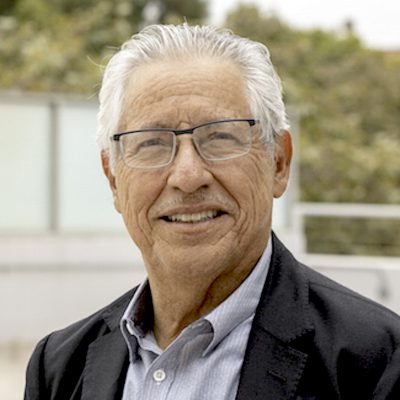 person with glasses outdoors