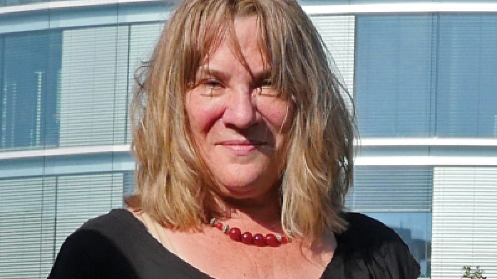 portrait of woman outside a building