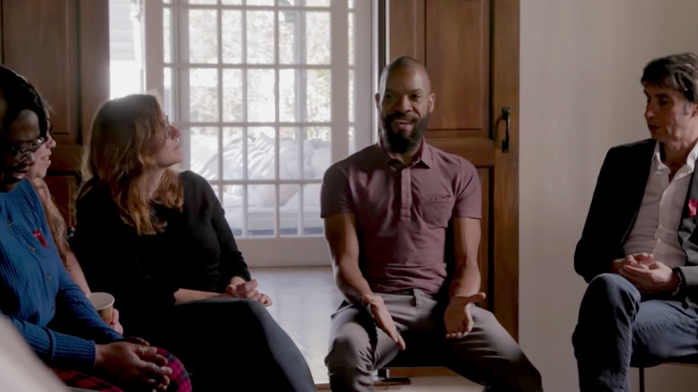 Marques Vestal, center, who will join the Luskin School's urban planning faculty this year, shares his views on college debt in the documentary "You Are Not a Loan."
