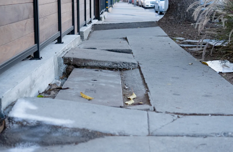 sidewalk with cracked concrete