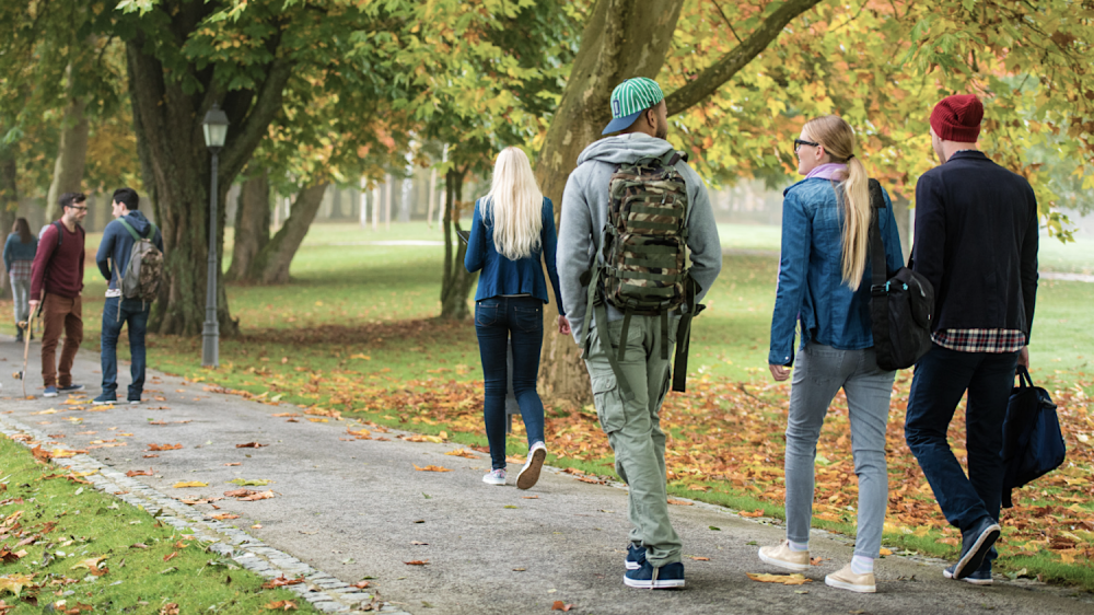 students walking on college campus