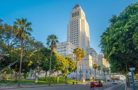 tall white building against blue sky