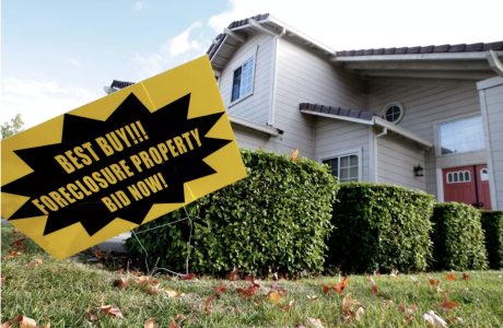 foreclosure sign in front of house