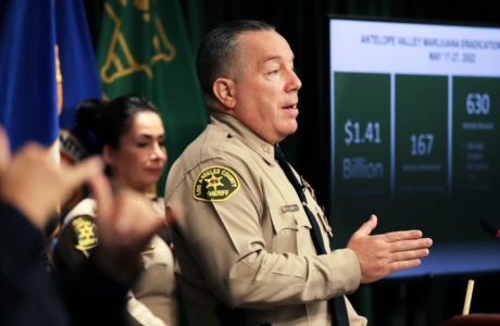 Man in sheriff uniform at podium