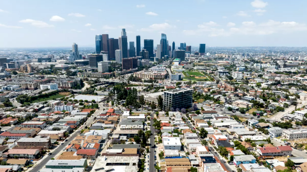 downtown Los Angeles skyline with residential neighborhoods in foreground