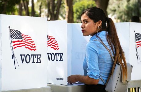 Woman at outdoor voting station