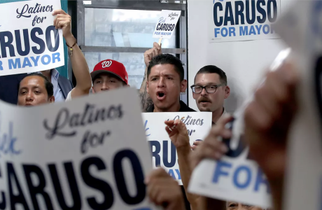 Men with campaign signs
