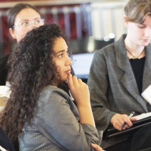Students listening to a presentation