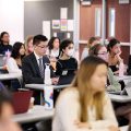 College students seated in a classroom