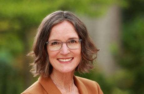 woman with glasses and short brown hair