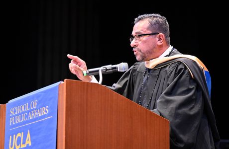 Paco Retana MSW '90, who has served L.A.'s marginalized communities for more than 30 years, addresses the Class of 2024. Photo by Todd Cheney