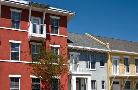 row of colorful apartment buildings