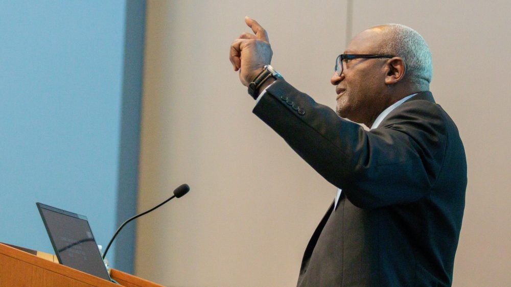 African American Robert Bullard gestures during a talk at UCLA