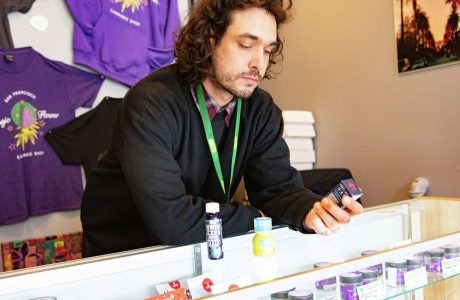 man behind counter of SF pot shop