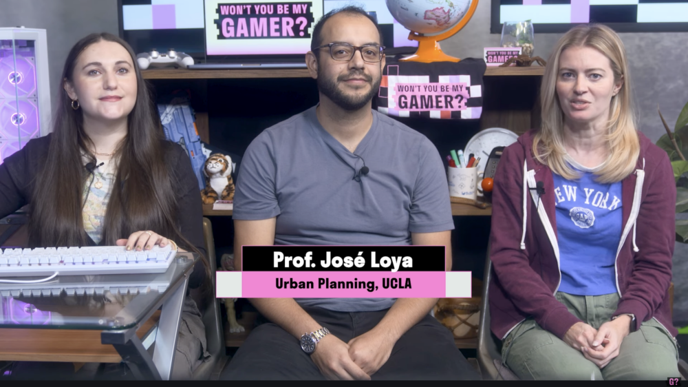 Assistant Professor José Loya sits between the two hosts of PBS SoCal’s Won’t You Be My Gamer? during the show’s gameplay and discussion.|Landscape of New York City