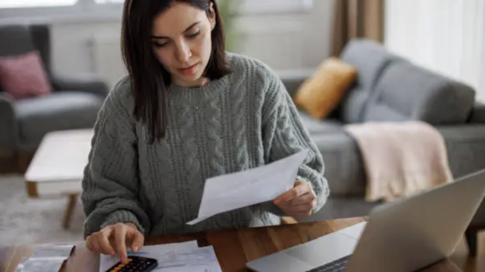 woman looking at expenses