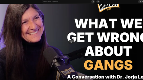 Photo of Jorja Leap professor of social work smiling on the left with "What we get wrong about gangs" on the right which is the thumbnail for the podcast episode