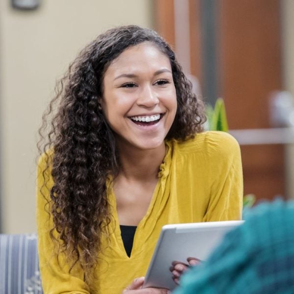 Social Worker smiles at colleague