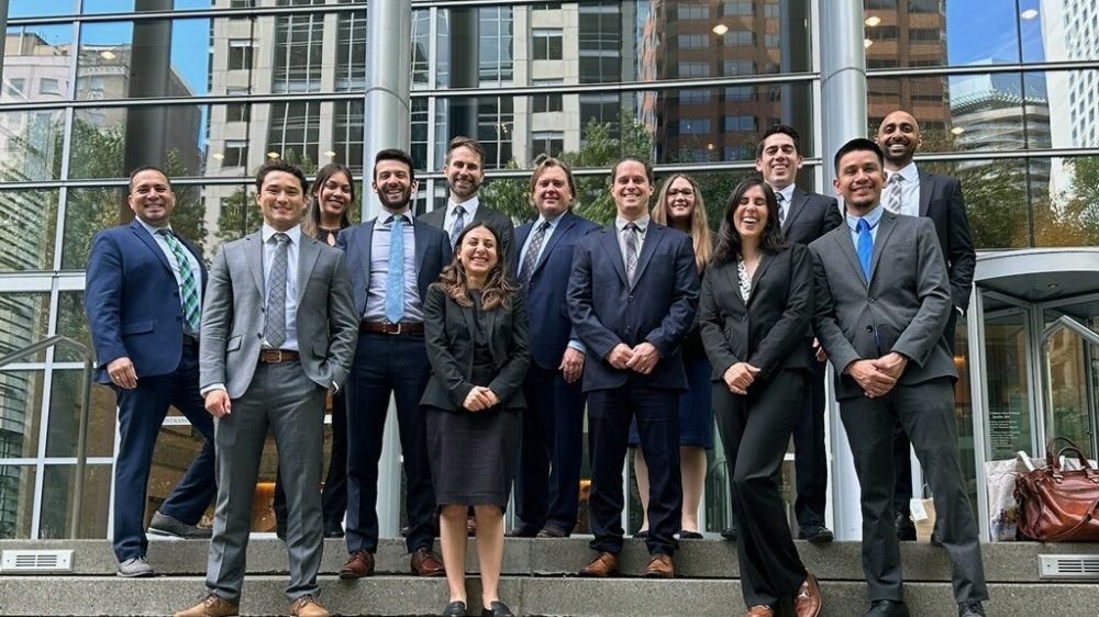Group photo of the Voting Rights Project team including students and Chad Dunn and Matt Barreto.|Voting Rights Project team stands in front of the States of United States Court House|Galveston Trial group photo of Voting Rights Project Team with Chad Dunn|headshot of Chad Dunn|