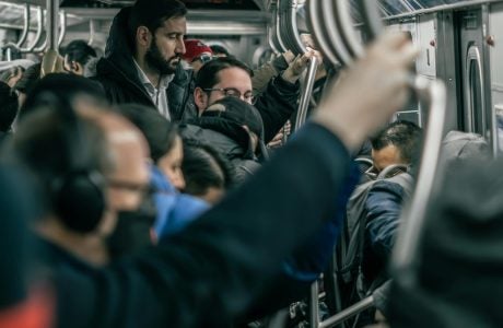 People taking the subway.
