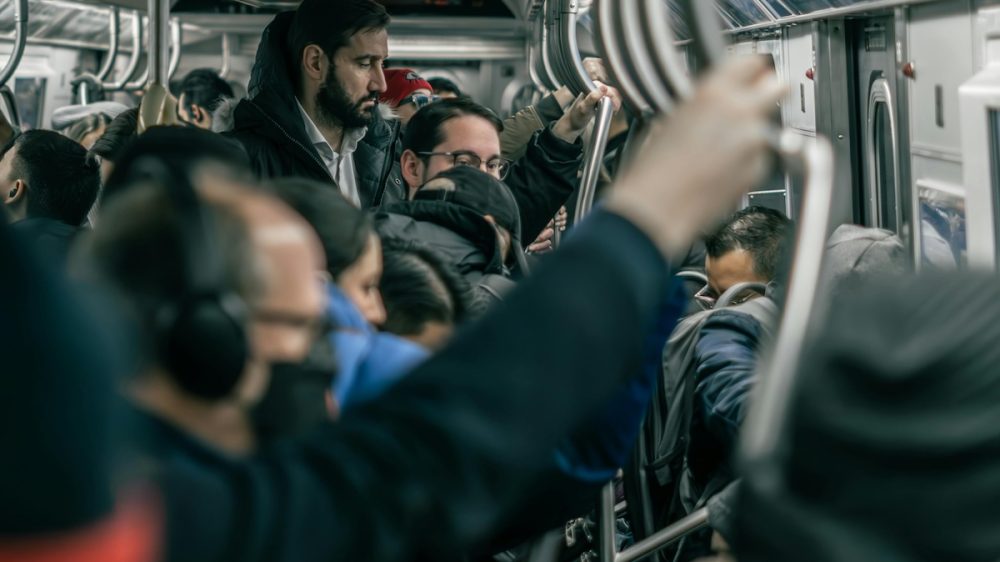 People taking the subway.