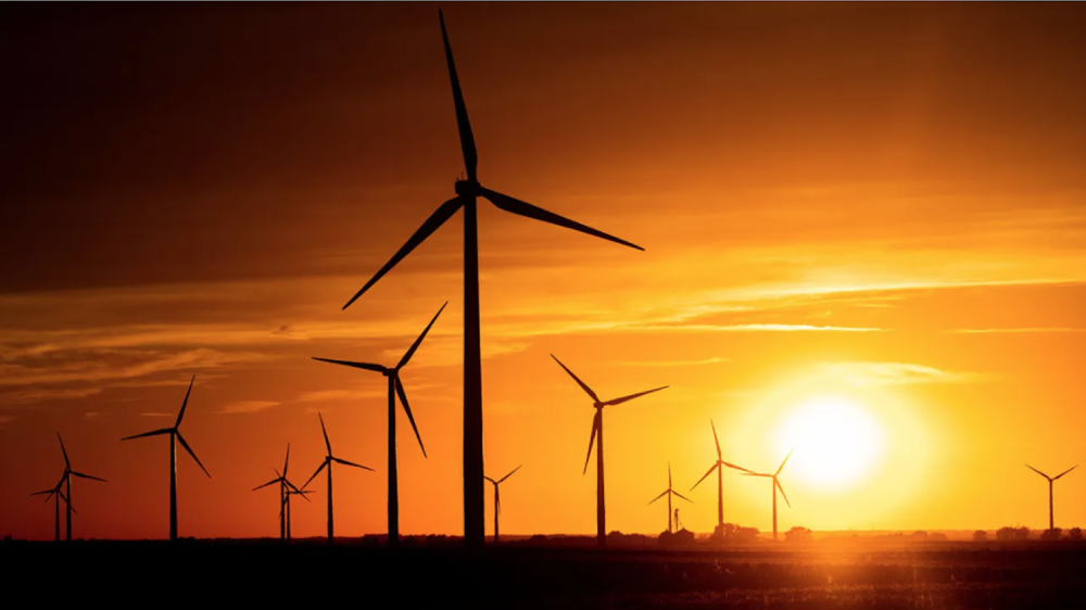 Wind turbines at sunset