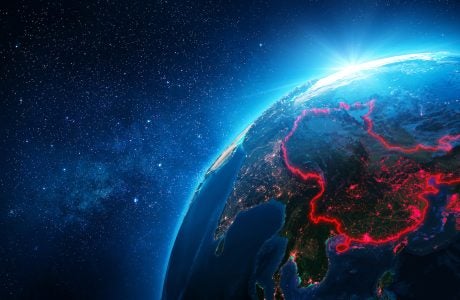 stock photo represents China outlined on a globe as seen from space