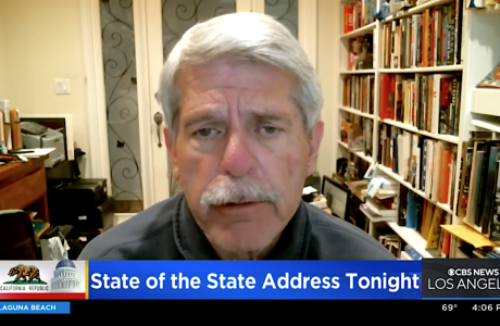 Man speaking on television news