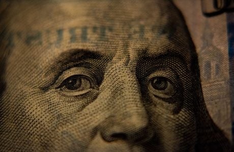 A closeup of a U.S. hundred-dollar bill (Benjamin Franklin side).