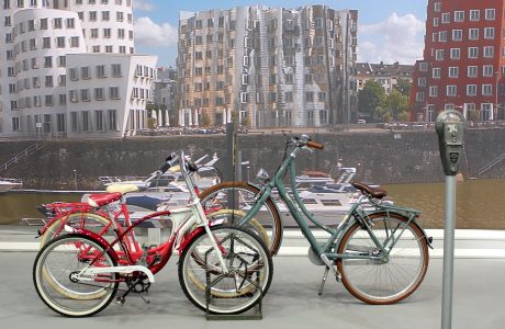 bicycles, parking meter and city skyline