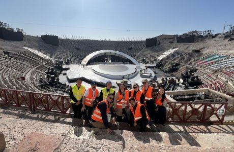 eam members from the Office of Major Events visited the historic Verona Arena, site of the Paralympic Opening Ceremony, for an accessibility tour.|||||||||||John Kerr and Peyton Johnson stand together in front of Seine River in Paris, France.