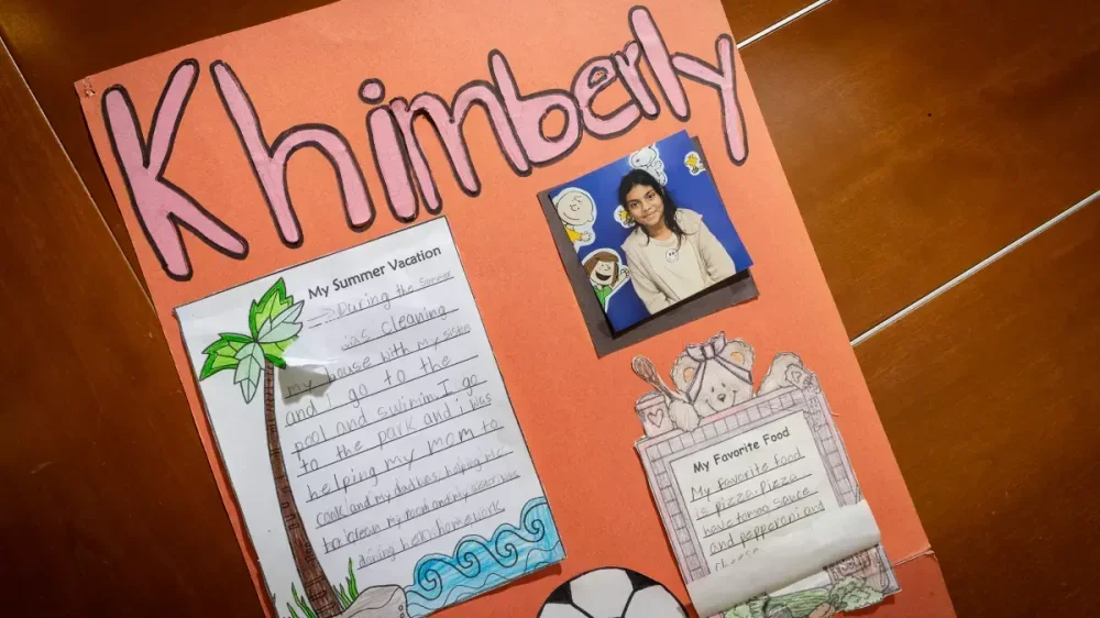 Twelve-year-old Khimberly Zavaleta Chuquipa died after an alleged bullying incident at her school. (Jason Armond / Los Angeles Times)|Person hugging their knees.|