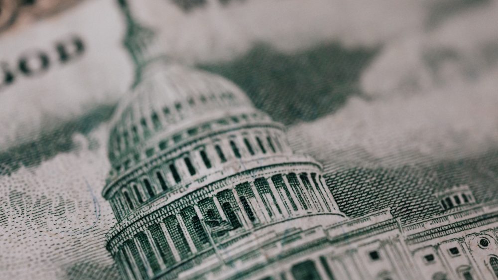 closeup of government capitol building on U.S. currency