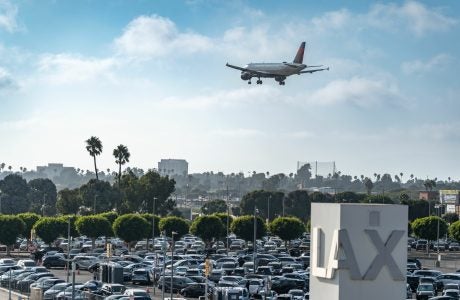 LAX airport with airplane about to land at the airport.