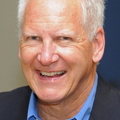 Person wearing shirt and jacket