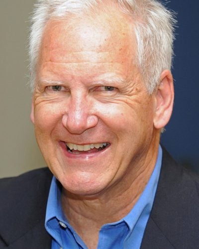 Person wearing shirt and jacket